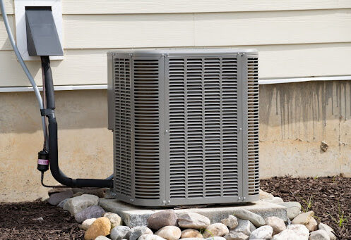 Outdoor AC unit installed in home in Palm Beach County.